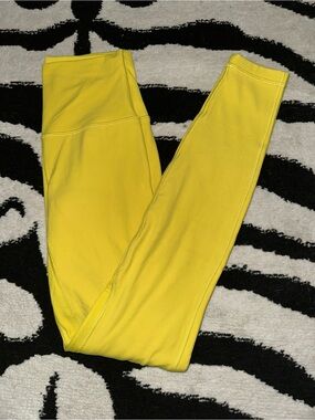 lululemon athletica double lined aligns in highlighter yellow size 4 full length